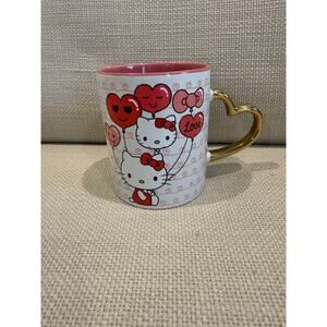 Hello kitty Valentine’s Day mug with gold heart handle